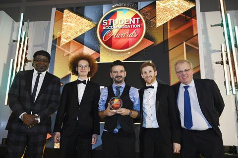 EcoSync/Corpus Christi winners Peter Nitsche-Whitfield, Simon Brown & Len Don accept the gong from Unipol’s Paddy Jackman