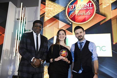 Martina Pardo of A Designer at Heart gets the Supplier trophy from EcoSync’s Len Don